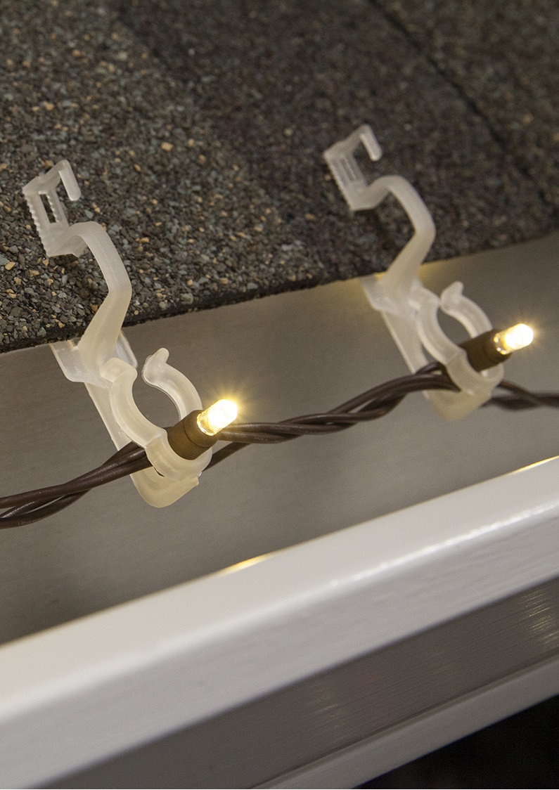 mini led christmas lights hanging on shingles with omni all in one light clips