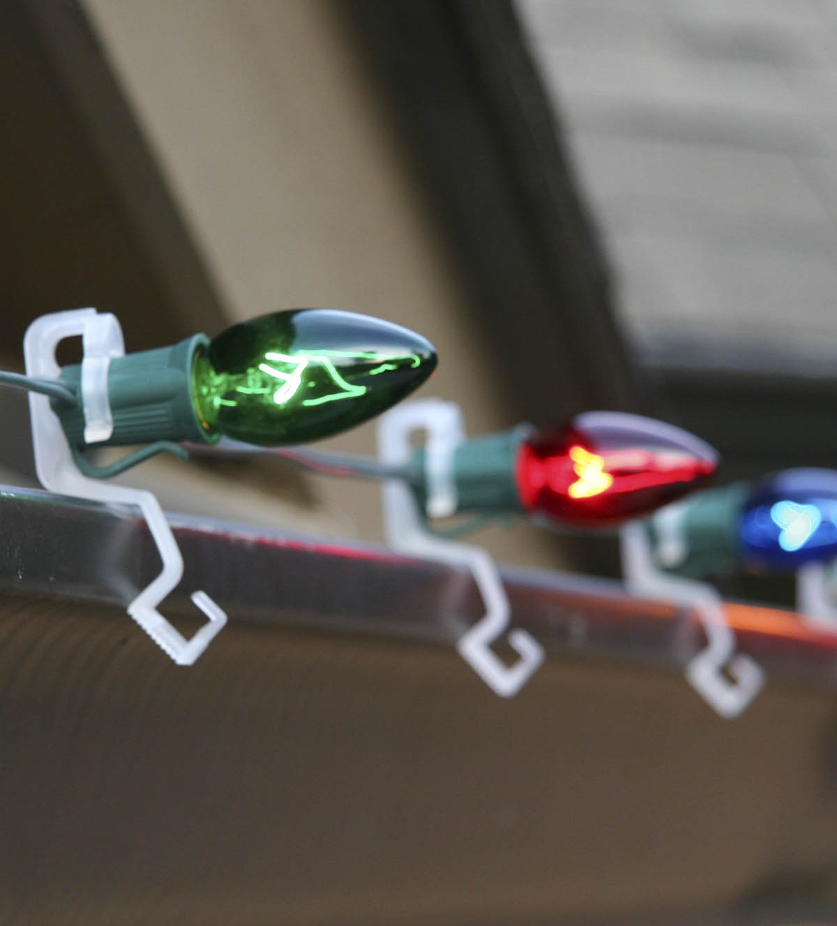 OMNI all in one light clips hang C9 bulbs on gutters