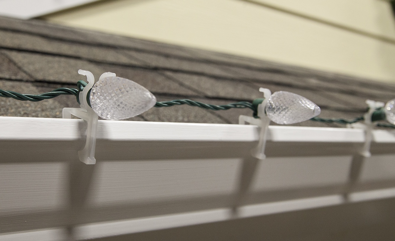 C9 led light strings hanging on gutters with all in one light clips
