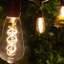 ST64 Suspended FlexFilament&reg 5W LED Edison Bulb Patio Lights, Commercial Black Wire