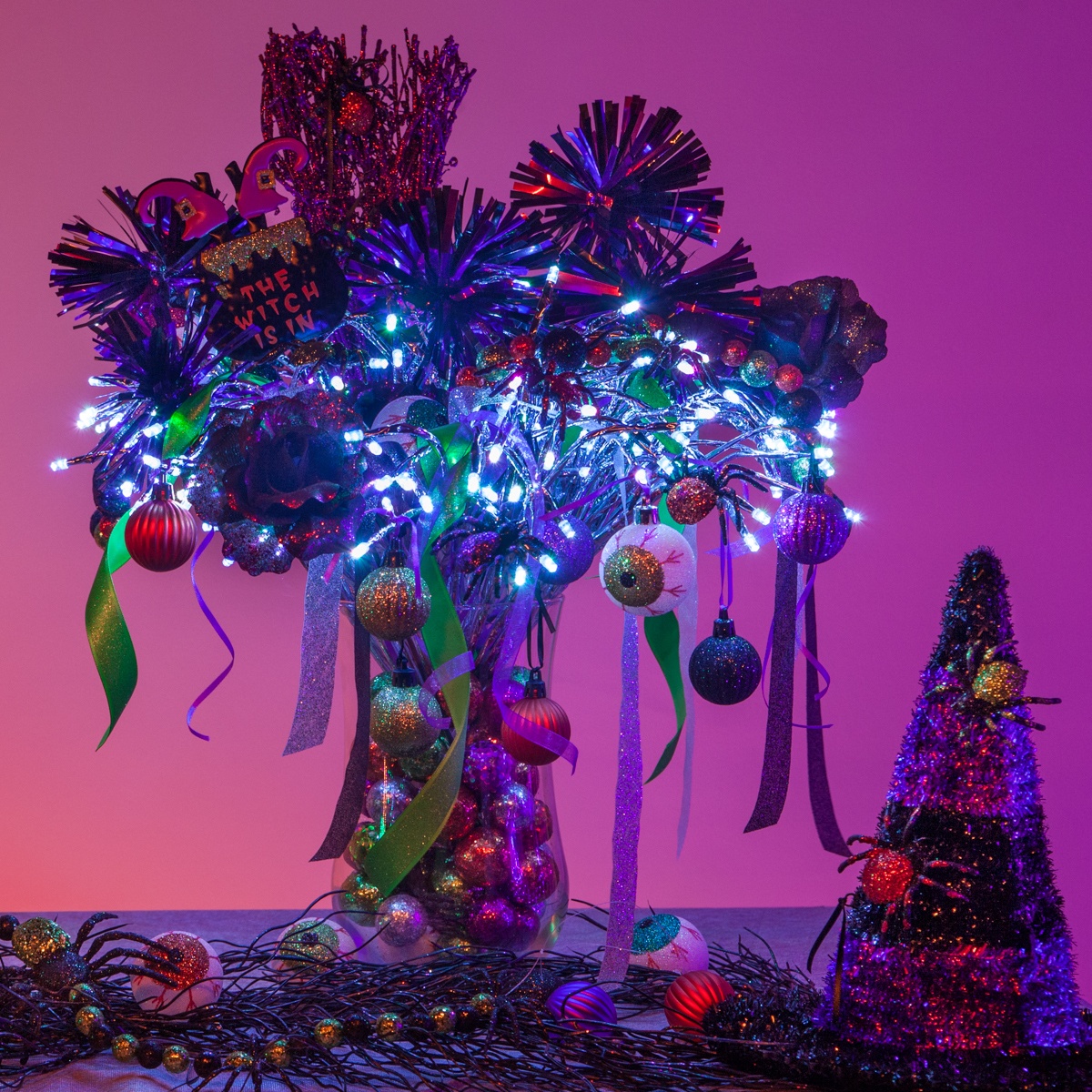 DIY Halloween Decoration with Starburst Lighted Branches, Spiders, Ornaments & Ribbon