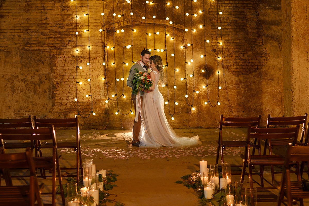 String Lights Create a Gorgeous Backdrop for Wedding Photos